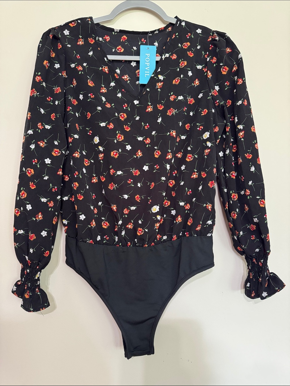 POPVIL Black Floral Long-Sleeve Bodysuit with Red Floral Print. 

PTP =18